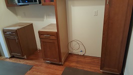 Kitchen Cabinets Prepping For Refrigerator Installation In Surround