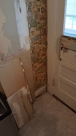 Removing Drywall Reveals Panelling